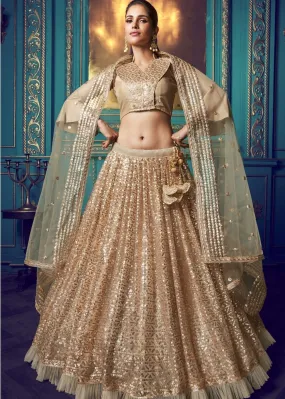 Golden Designer Soft Net Lehenga Choli with Ruffles and Sequin work